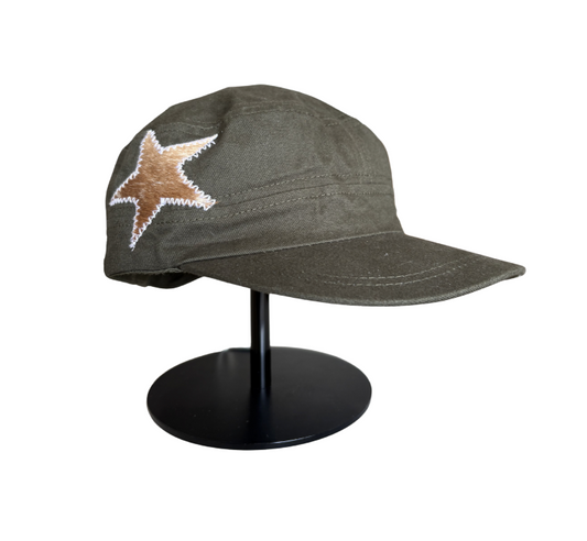 Green hat, cow star, lavender stitching